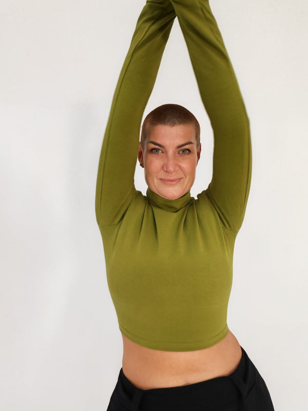 Turtle Neck Long Sleeve Crop Top with Hole in Guacomole - Manners London