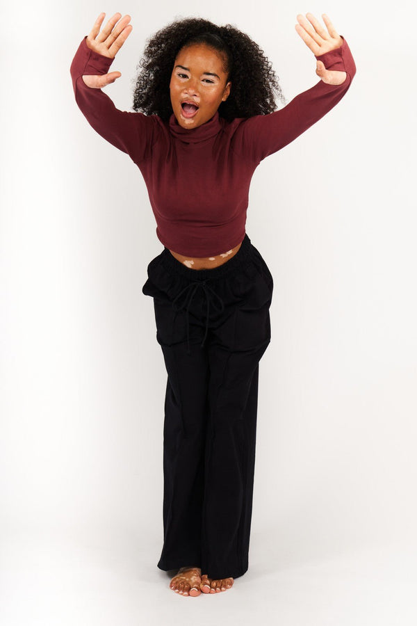 Turtle Neck Long Sleeve Crop Top with Hole in Tawny Port - Manners London