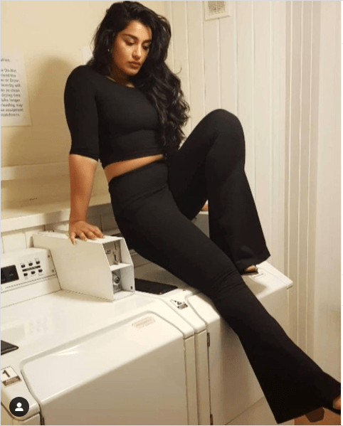 Faiza Flare Trousers in Black - Manners London