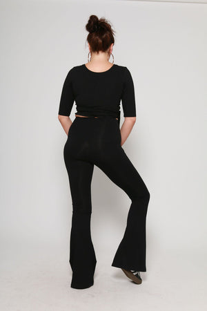 Faiza Flare Trousers in Black - Manners London