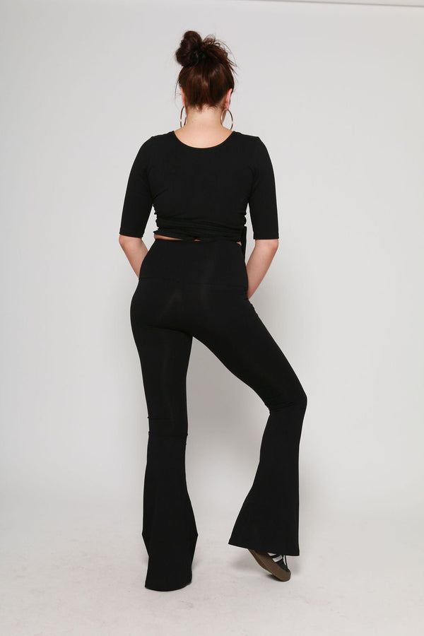 Faiza Flare Trousers in Black - Manners London