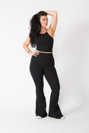Faiza Flare Trousers in Black - Manners London