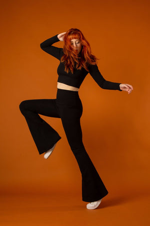 Faiza Flare Trousers Petite in Black - Manners London