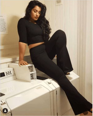 Faiza Flare Trousers Petite in Black - Manners London